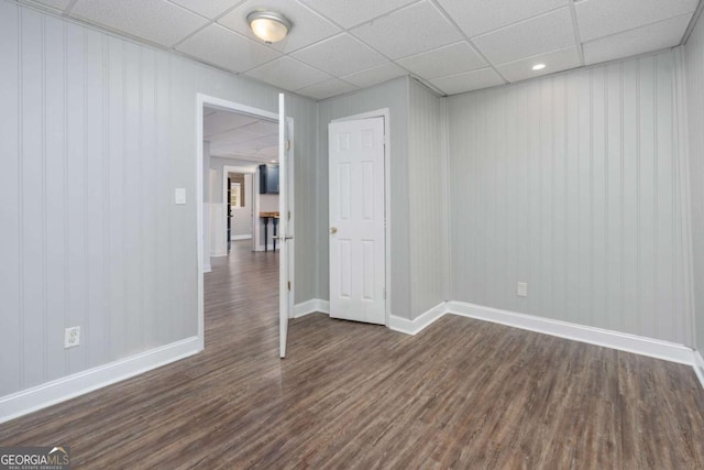 spare room featuring dark hardwood / wood-style flooring