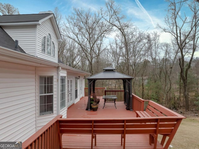 wooden terrace with a gazebo