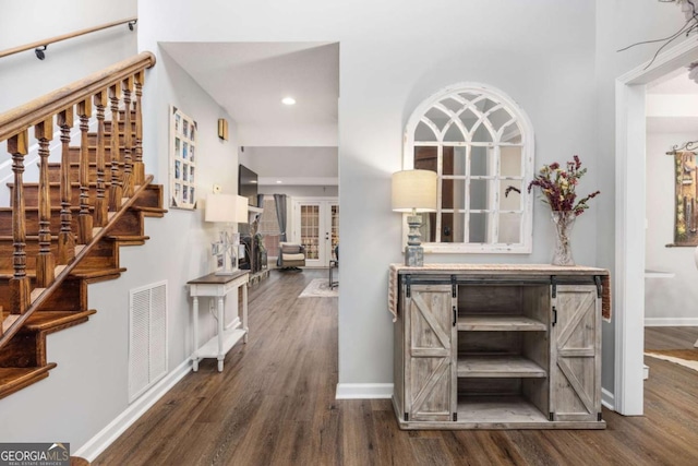 interior space with hardwood / wood-style flooring