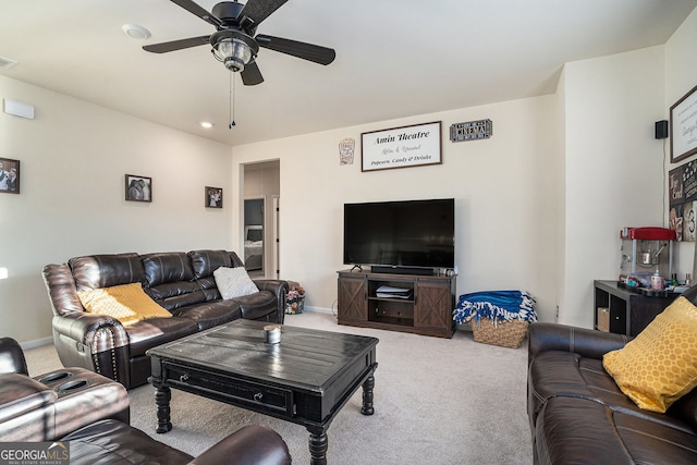 carpeted living room featuring recessed lighting, visible vents, baseboards, and a ceiling fan