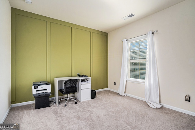 home office featuring carpet flooring, baseboards, and visible vents