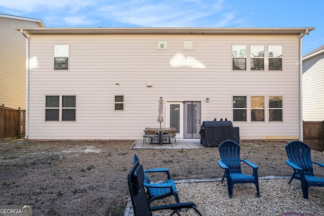 rear view of property with a patio