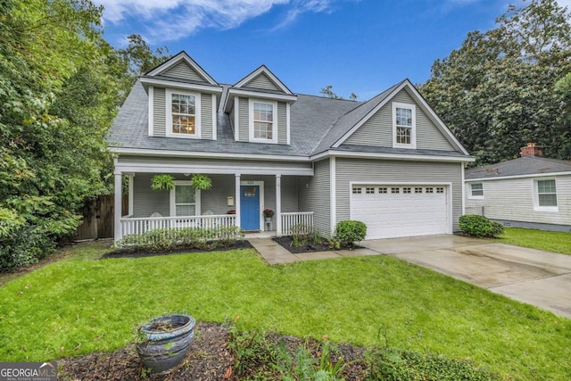 view of front of property featuring a garage, covered porch, and a front lawn