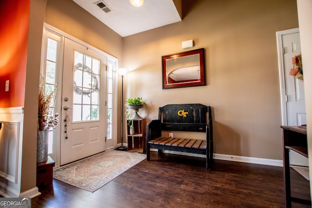 foyer entrance with dark wood-type flooring