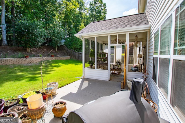 view of patio / terrace with a sunroom