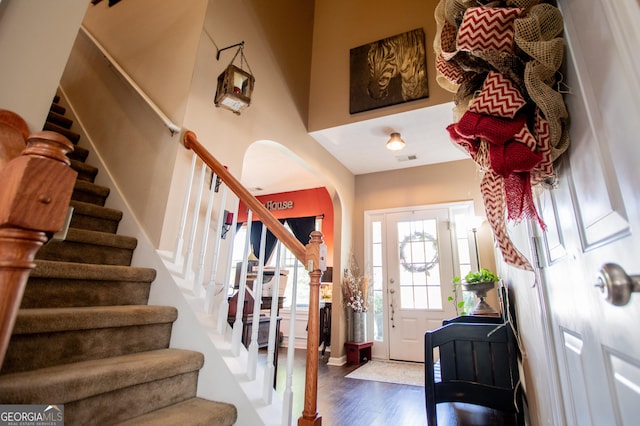 entrance foyer featuring dark hardwood / wood-style flooring