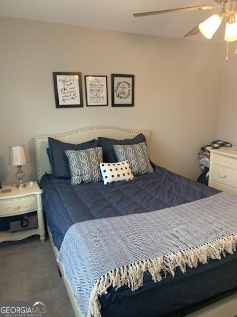 bedroom featuring carpet floors and ceiling fan