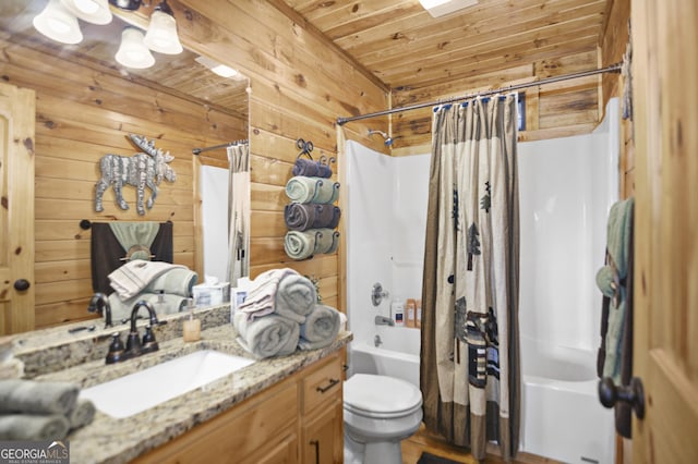 full bathroom featuring shower / bath combo, wood ceiling, vanity, toilet, and wood walls