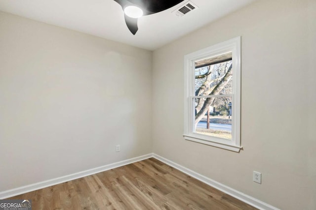 unfurnished room featuring light hardwood / wood-style flooring