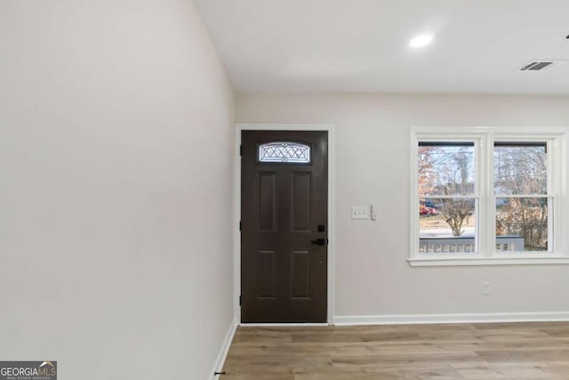 foyer entrance featuring light hardwood / wood-style floors