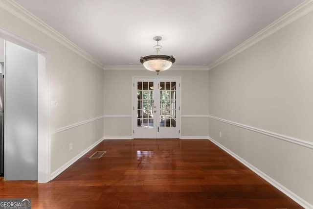 unfurnished dining area with french doors, dark hardwood / wood-style flooring, and ornamental molding