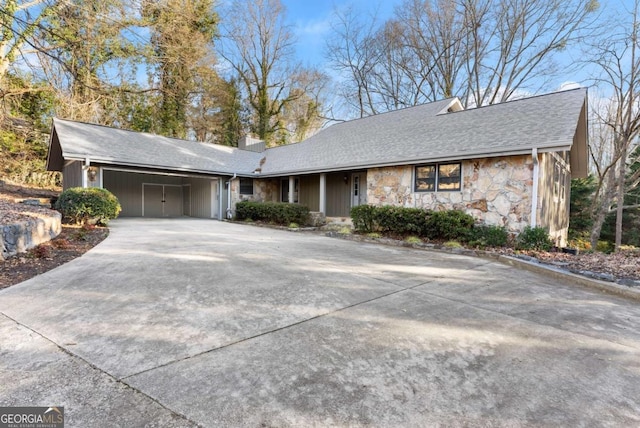 ranch-style home featuring a carport