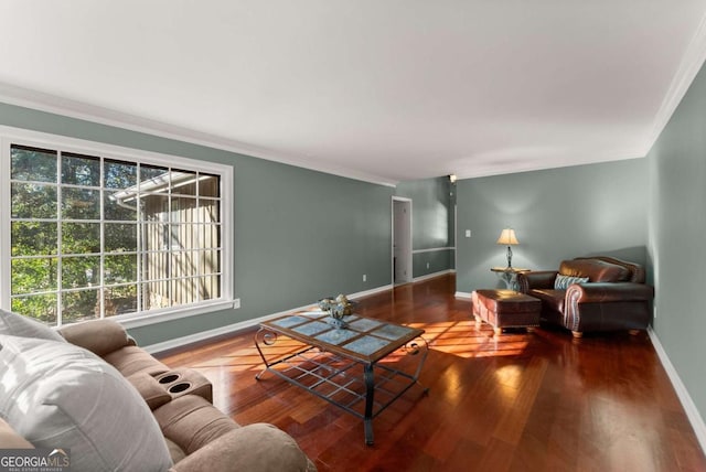 living room featuring crown molding and hardwood / wood-style floors