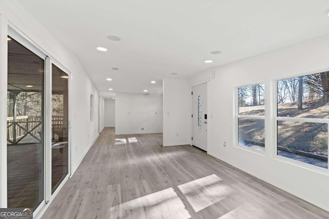 unfurnished room featuring light wood-type flooring