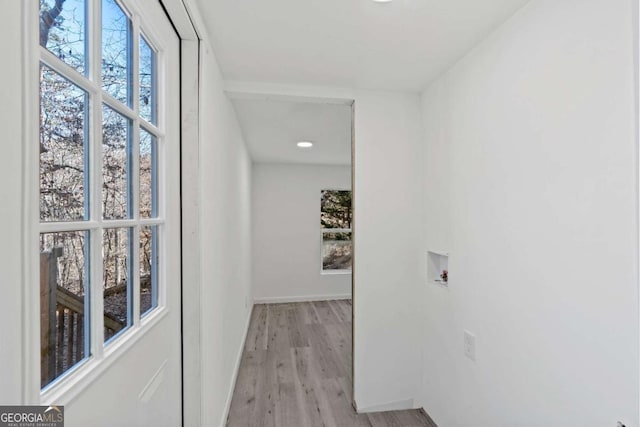 corridor featuring light wood-type flooring