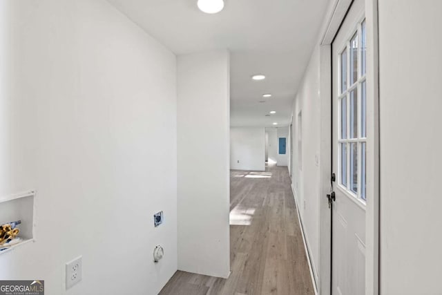 hallway featuring light hardwood / wood-style floors