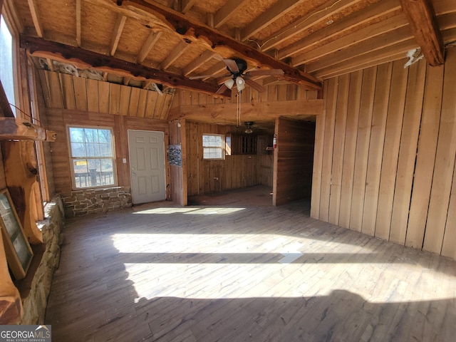 interior space featuring ceiling fan