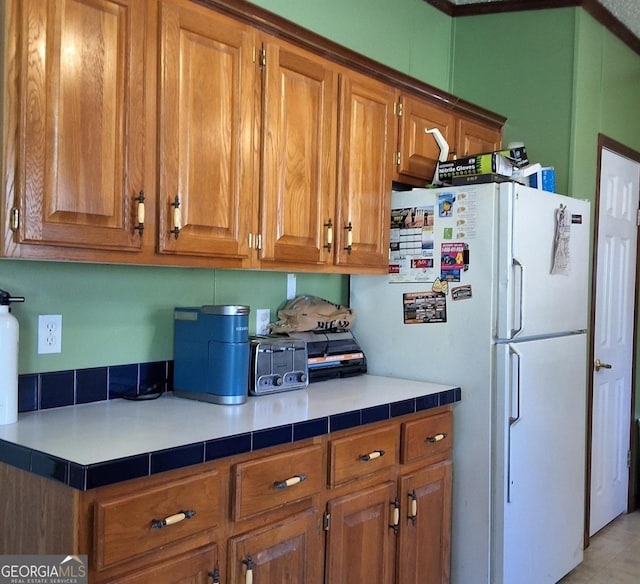 kitchen featuring white refrigerator