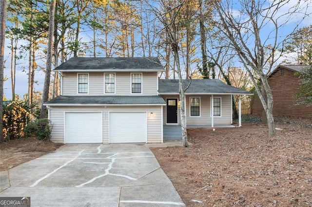 view of front of property featuring a porch and a garage