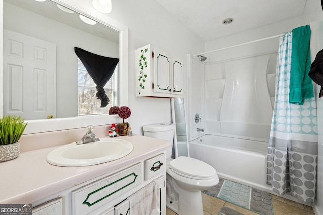 full bathroom featuring tile patterned flooring, shower / bath combination with curtain, vanity, and toilet