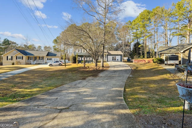 exterior space featuring a front yard and a garage