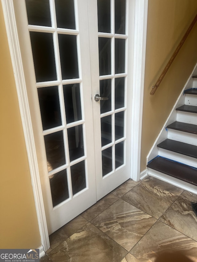 entryway featuring french doors