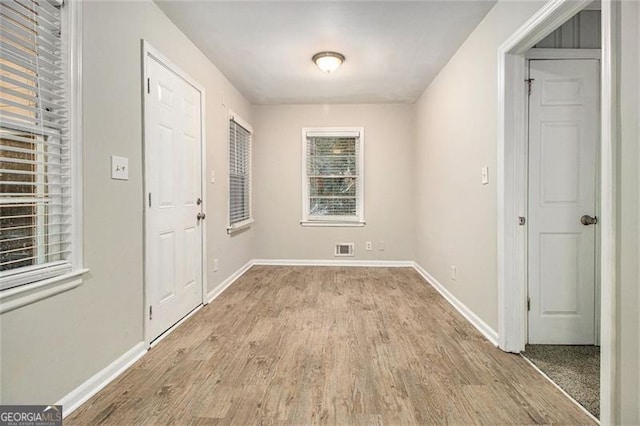 entrance foyer with light wood-type flooring