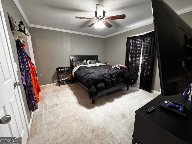 bedroom with ceiling fan, carpet floors, and ornamental molding