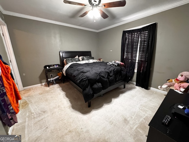 bedroom featuring ceiling fan, crown molding, and light colored carpet