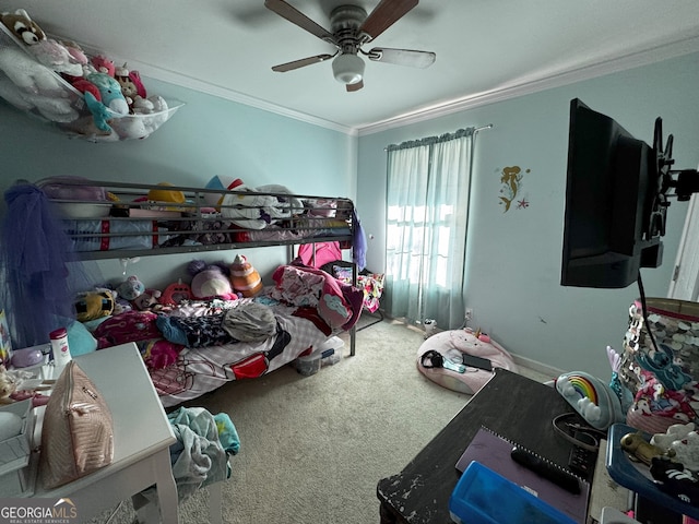 bedroom featuring carpet flooring, ceiling fan, and crown molding