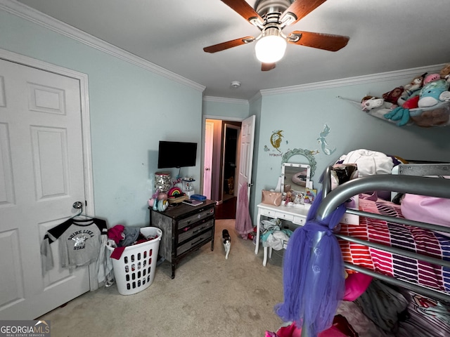 bedroom featuring ceiling fan, crown molding, and light colored carpet