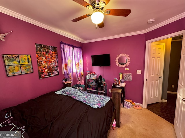 bedroom featuring carpet flooring, ceiling fan, and ornamental molding