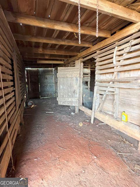 miscellaneous room with wood ceiling