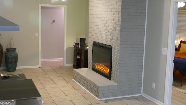 living room featuring light tile patterned floors and a brick fireplace