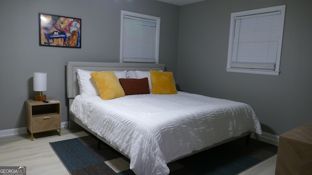 bedroom with light hardwood / wood-style flooring