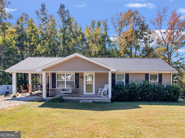 ranch-style house with a front lawn and a porch