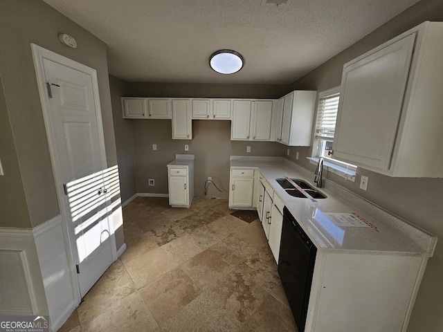 kitchen with white cabinets, dishwasher, a textured ceiling, and sink