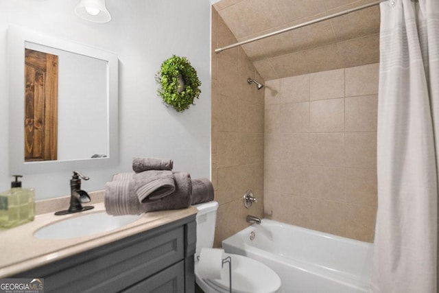 full bathroom featuring vanity, toilet, and shower / bath combo with shower curtain