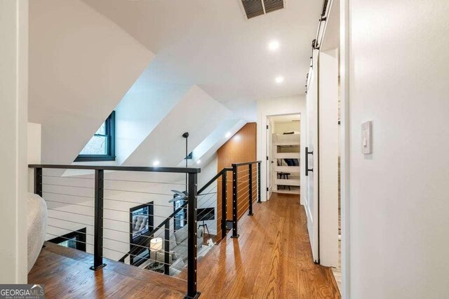 hallway featuring light hardwood / wood-style flooring