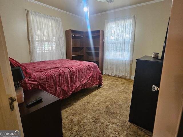 bedroom featuring ornamental molding and carpet flooring