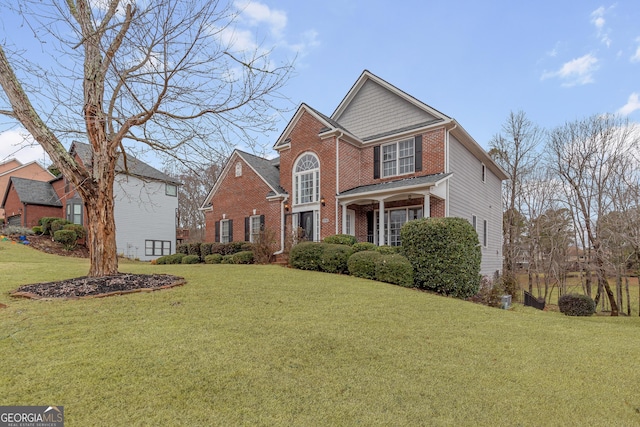 view of property featuring a front yard