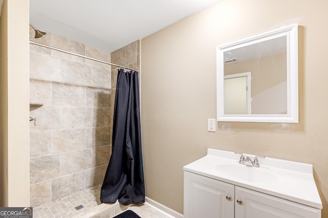 bathroom with a shower with curtain and vanity