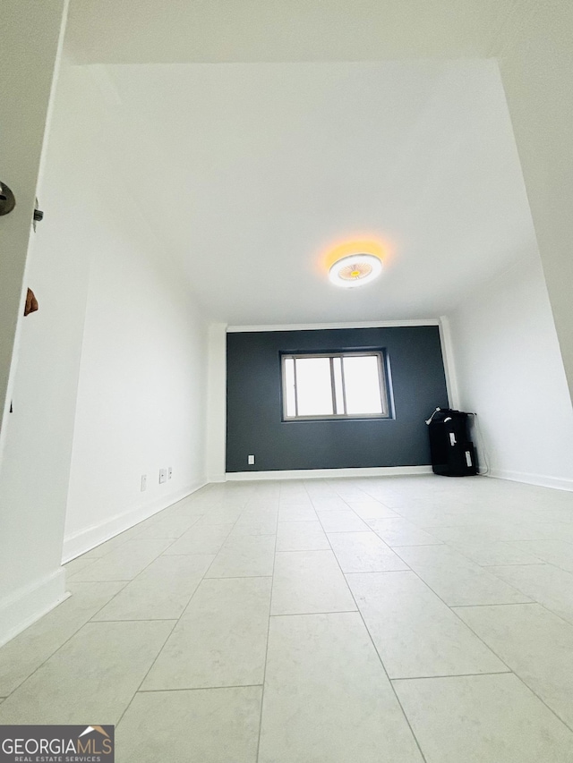 view of tiled spare room