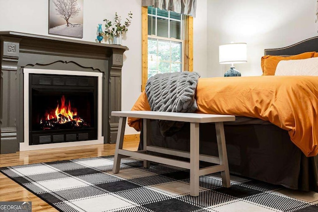 bedroom featuring wood-type flooring