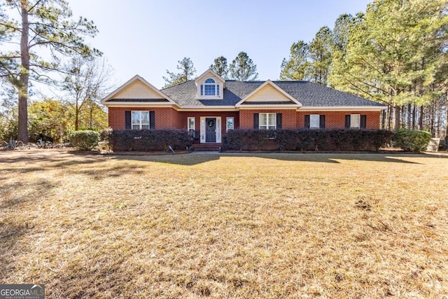 view of front of home with a front lawn