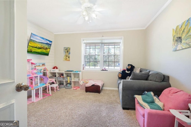 game room featuring light carpet, ceiling fan, and ornamental molding