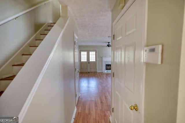 hall with light wood-type flooring