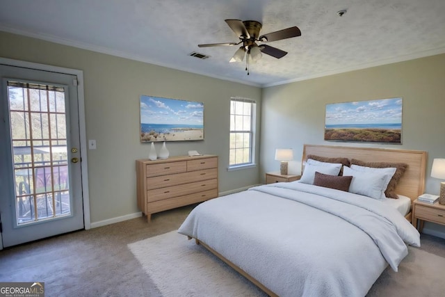 carpeted bedroom featuring access to exterior, multiple windows, ceiling fan, and crown molding