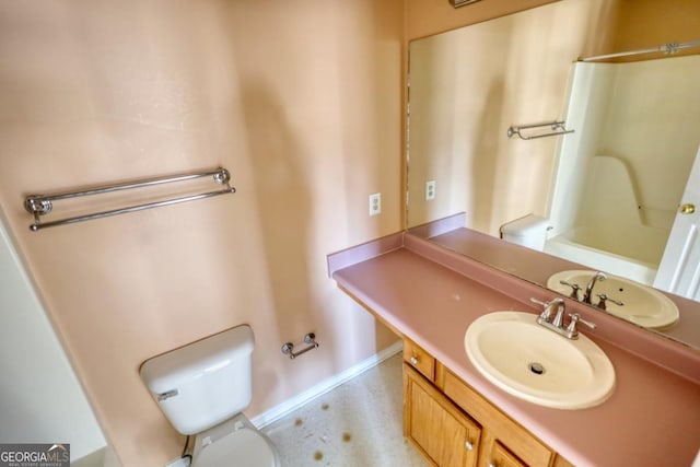 bathroom with vanity and toilet