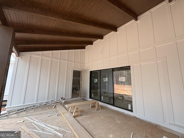 doorway to property featuring board and batten siding